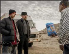  ?? FRITO-LAY VIA AP ?? Aaron Paul, Bryan Cranston and Raymond Cruz in the Popcorners spot.