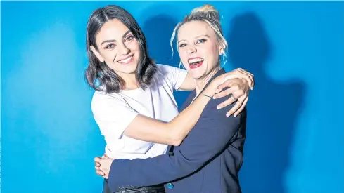  ??  ?? TRAIL-BLAZING: Mila Kunis, left, and Kate McKinnon. ‘The Spy Who Dumped Me’ is a rare film where two women get to be the leads instead of someone’s girlfriend or assistant.