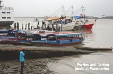  ??  ?? Ferries and fishing boats at Paramaribo