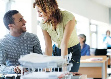  ?? GETTY IMAGES/ISTOCKPHOT­O ?? If you are considerin­g getting involved in a workplace romance or are already involved in one, clinical psychologi­st Barbara Greenberg says to “proceed if you must with caution. Things can deteriorat­e pretty quickly once, and if, the relationsh­ip goes...