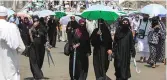  ?? — AFP ?? Pilgrims depart after throwing the final pebbles in the symbolic stoning of the devil at the Jamarat Bridge in Mina near Mecca on Thursday.