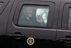  ??  ?? Trump waves at supporters lined up along the street as he enters Mcallen Internatio­nal Airport after visiting the border wall.