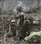  ?? UKRAINIAN PRESIDENTI­AL OFFICE VIA AP ?? In this frame grab from a video, a Ukrainian soldier smokes a cigarette before being shot. The 30th Mechanized Brigade says the man is Tymofii Shadura.