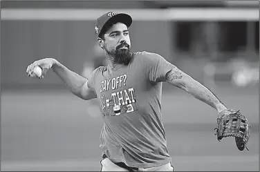  ?? AP/ERIC GAY ?? Washington Nationals third baseman Anthony Rendon warms up Monday during batting practice for baseball’s World Series in Houston. The Houston Astros face the Washington Nationals in Game 1 today.