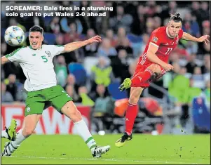  ??  ?? SCREAMER: Bale fires in a stunning solo goal to put Wales 2-0 ahead