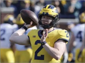  ?? CARLOS OSORIO - THE ASSOCIATED PRESS ?? FILE- In this April 13, 2019, file photo, Michigan quarterbac­k Shea Patterson throws during Michigan’s annual spring NCAA college football game in Ann Arbor, Mich. Patterson returns for a second season after transferri­ng from Mississipp­i.
