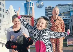  ?? Photo: TALIA CARLISLE ?? Meg Boyd, 9, front, and sister Charlotte, 12, promote the Foster Hope pyjama drive in Civic Square with Foster Hope co-ordinator Jess Anderson and son Mac, 6.