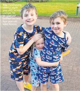  ?? ?? Trio Fundraisin­g siblings eightyear-old Cammy Lockyer, his six-year-old brother Leo and four-year-old sister Aurora