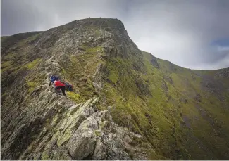  ??  ?? ABOVE The aptly named Sharp Edge, a spiky and precarious route to the peak of Blencathra