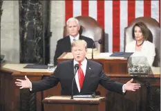  ?? Andrew Harnik / Associated Press ?? President Donald Trump delivers his State of the Union address last February to a joint session of Congress on Capitol Hill in Washington, as Vice President Mike Pence and Speaker of the House Nancy Pelosi, D-Calif., watch. Two decades ago, President Bill Clinton delivered his State of the Union address before a nation transfixed by his impeachmen­t. He didn’t use the I-word once. Trump is far from the first president to deliver a State of the Union address in a time of turmoil.