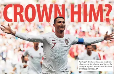  ??  ?? Portugal’s Cristiano Ronaldo celebrates after scoring the winning goal during the Group B against Morocco at the 2018 World Cup yesterday. AP