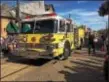  ?? KATHLEEN CAREY – DIGITAL FIRST MEDIA ?? Media firetrucks drive down State Street in the Halloween parade.