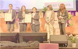  ?? Photograph courtesy of WWf-sWeden ?? dipolog city representa­tives (second and third from left) receive their award as opcc national Winner of philippine­s during the opcc global awarding ceremony in helsingbor­g, sweden, last June 2.