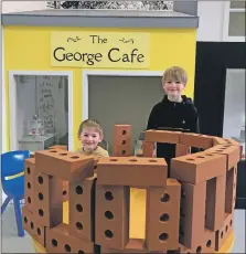  ?? ?? Michael and Ian Clark build a mini McCaig's tower at Rockfield's new Heritage Kids Space.