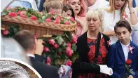  ??  ?? Saffie- Rose Roussos was the youngest of the 22 victims of the Manchester Arena attack. Her mother Lisa, pictured left at Saffie’s funeral, was seriously wounded in the blast