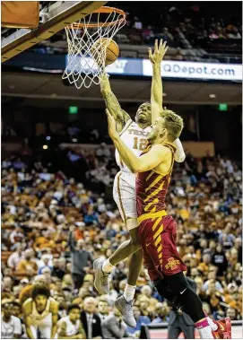  ?? RICARDO B. BRAZZIELL / AMERICAN-STATESMAN ?? Texas guard Kerwin Roach II (12) tied his career high with 22 against Iowa State on Monday, and his free-throw shooting has also helped mitigate the Longhorns’ recent troubles at the basket.