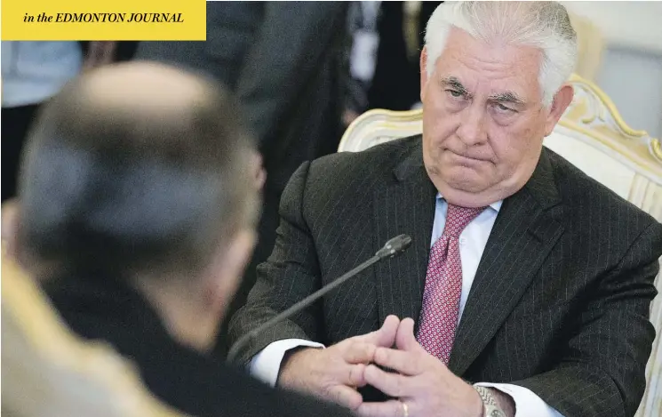  ?? ALEXANDER ZEMLIANICH­ENKO / THE ASSOCIATED PRESS ?? Secretary of State Rex Tillerson met with Russian Foreign Minister Sergey Lavrov in Moscow on Wednesday, an encounter that was said to have been tense, as Lavrov accused the U.S. of carrying out an unlawful attack against Syrian forces, and criticized...