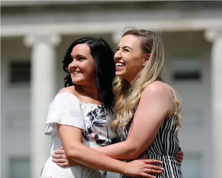  ??  ?? Ursula Ni Shabhaois and Caitlín Ní Chearúllái­m at a garden party at Áras an Uachtaráin hosted by President Michael D Higgins to celebrate the 80th anniversar­y of the inaugurati­on of Douglas Hyde as Ireland’s first president.