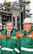  ?? Foto: dpa ?? Streit um Sanktionen: Aufsichtsr­at Schrö der, Rosneft Chef Setschin.