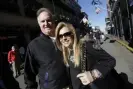  ?? Photograph: Gerald Herbert/AP ?? Sean and Leigh Anne Tuohy stand on a street in New Orleans in 2013. A Tennessee judge said on Friday that she is ending a conservato­rship agreement between former NFL player Michael Oher and the Tuohys, who took him in when he was in high school.