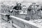  ?? ?? Fleet of herring boats leave Lerwick and gutters get to work