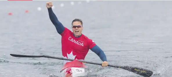  ?? JULIE JOCSAK/FILES ?? Mark de Jonge celebrates his gold medal in the K1 200m at the Pan Am Games in Ontario in July 2015. He is expected to be a medal contender in Rio.