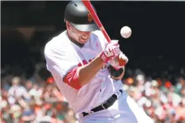  ?? KARL MONDON/STAFF ?? Giants catcher Buster Posey is hit by a pitch from the Reds’ Barrett Astin in the second inning.