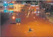  ?? AFP ?? A kayaker paddles down a portion of a highway after flooding in Philadelph­ia, Pennsylvan­ia