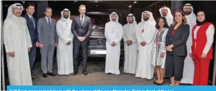  ?? ?? Gulf Bank management team with the winner of the new Mercedes-Benz in front of the car