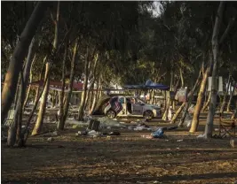  ?? SERGEY PONOMAREV — THE NEW YORK TIMES ?? The site of the music festival that was attacked by Hamas gunmen four days earlier, a few miles from the border with Gaza in Be'eri kibbutz, Israel, on Wednesday.