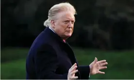  ?? Photograph: Joshua Roberts/Reuters ?? Trump on the White House’s south lawn on Friday, with swept-back, wind-blown hair and tan.