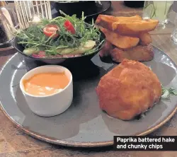  ??  ?? Paprika battered hake and chunky chips