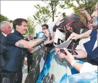  ?? PROVIDED TO CHINA DAILY ?? Johnny Depp greets fans at the global premiere of in Shanghai on May 11.