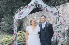  ??  ?? Tresa-May and Fred Negus in Stanley Park, Gosport, after their marriage in Fareham Register Office on July 30.