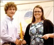  ?? Photo by Mike Eckels ?? During the 2017 Awards program at Peterson Gym in Decatur May 8, Ryan Shaffer (left) received the Decatur Chamber of Commerce’s Valedictor­ian Scholarshi­p from Ladale Clayton, chamber vice-president, in the amount of $300. Before the program, the...