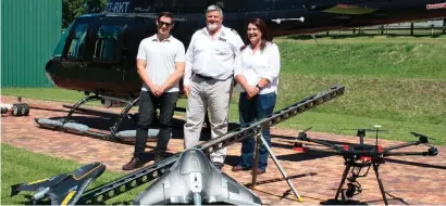  ??  ?? The VPM Surveys team show off the high-tech tools of their trade. From left are Cameron Kohler, remotely piloted aircraft system pilot and profession­al land surveyor; Rohan Kohler, commercial helicopter pilot and profession­al land surveyor; and Elmarie...