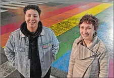  ?? SEAN D. ELLIOT/THE DAY ?? Alix O’Neill, left, and Lilith Davies-Smith stand by the Pride mural Friday at Eugene O’Neill Drive and Golden Street in New London. O’Neill is an adult volunteer with outCT while Davies-Smith participat­ed in programs and is now a volunteer as well.