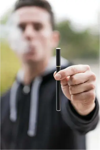  ??  ?? SMOKING SOLUTION? The Australian Government continues to resist calls to make vaping with nicotine liquid legal.