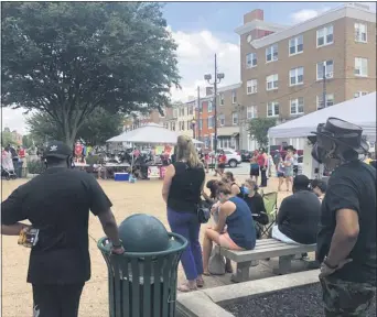  ?? KATHLEEN E. CAREY - MEDIANEWS GROUP ?? Observers to the Community Fest for #BlackLives­Matter in Media pause in silence.