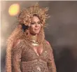  ?? MATT SAYLES, INVISION/AP ?? Beyoncé announced she was pregnant on Instagram Feb. 1, and performed at the Grammy Awards days later.