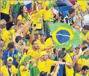  ?? AFP ?? Brazilian fans were in a buoyant mood after Philippe Coutinho gave the lead but Switzerlan­d’s equaliser stunned them into silence.