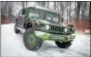  ?? PHOTO PROVIDED ?? A 1991 Humvee will be auctioned to benefit Feed Our Vets, a food pantry in Utica.