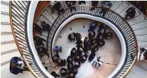  ?? ERIN SCHAFF/NEW YORK TIMES ?? U.S. Rep. Matt Gaetz of Florida and other House Republican­s speak outside the secure room where impeachmen­t investigat­ion interviews were taking place Wednesday on Capitol Hill in Washington, D.C.