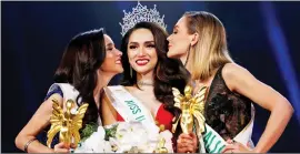  ??  ?? BEAUTY QUEENS: Contestant Nguyen Huong Giang of Vietnam flanked by runner-ups as she is crowned winner of the Miss Internatio­nal Queen 2018 transgende­r beauty pageant.