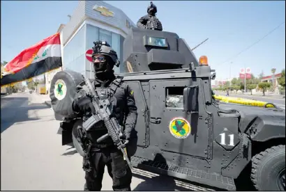  ??  ?? عنصران من قوات مكافحة الإرهاب في بغداد