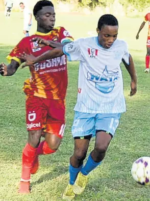  ?? FILE ?? Maldon High’s Chad Dennis (right) shields the ball from Cornwall College’s Giovanne Bruce during a Zone A Issa/digicel dacosta Cup match at Cornwall College on September 14. Cornwall College won 2-0.