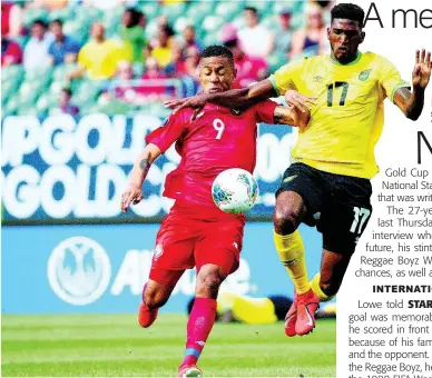  ?? AP ?? Jamaica’s Damion Lowe (right) and Panama’s Gabriel Torres battle for the ball during the first half of a CONCACAF Gold Cup match in Philadelph­ia last year.