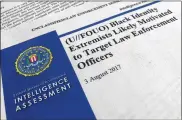  ?? JON ELSWICK / AP ?? An FBI report on the rise of "black identity extremists” is stirring fears of a return to practices of the Civil Rights era, when the agency spied on activist groups without evidence they had broken any laws.