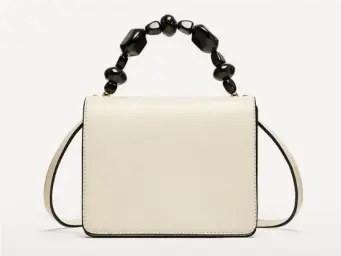  ??  ?? Mini City Bag with Handle Detail, £29.99, Zara
