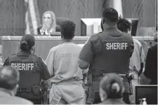  ?? Michael Wyke / Contributo­r ?? Ashim Taylor Jr. and Jayland Womack stand before Judge Denise Collins in the killing of Omar Ursin.